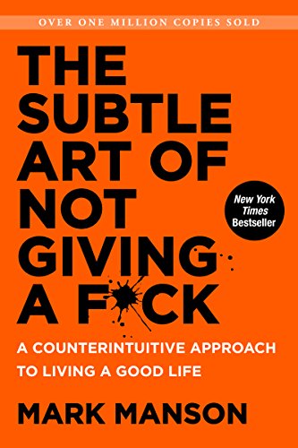 The orange book cover for the subtle art of not giving a fuck by Mark Manson.