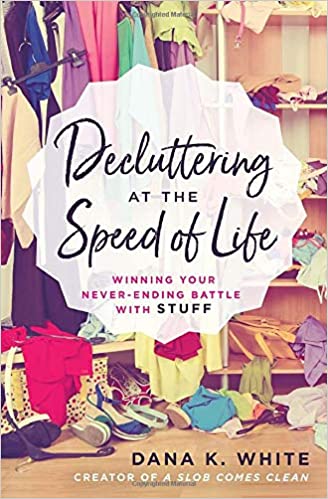 The book cover for Decluttering At The Speed of Life by Dana K White.